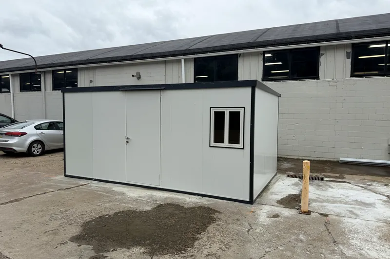Finished modular office with steel door and window, assembled by Solaxay on a commercial lot in Washington, PA